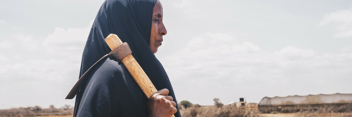 Diyaara stands in the farm that she used to provide food for her family. Photo: Khadija Farah/Oxfam