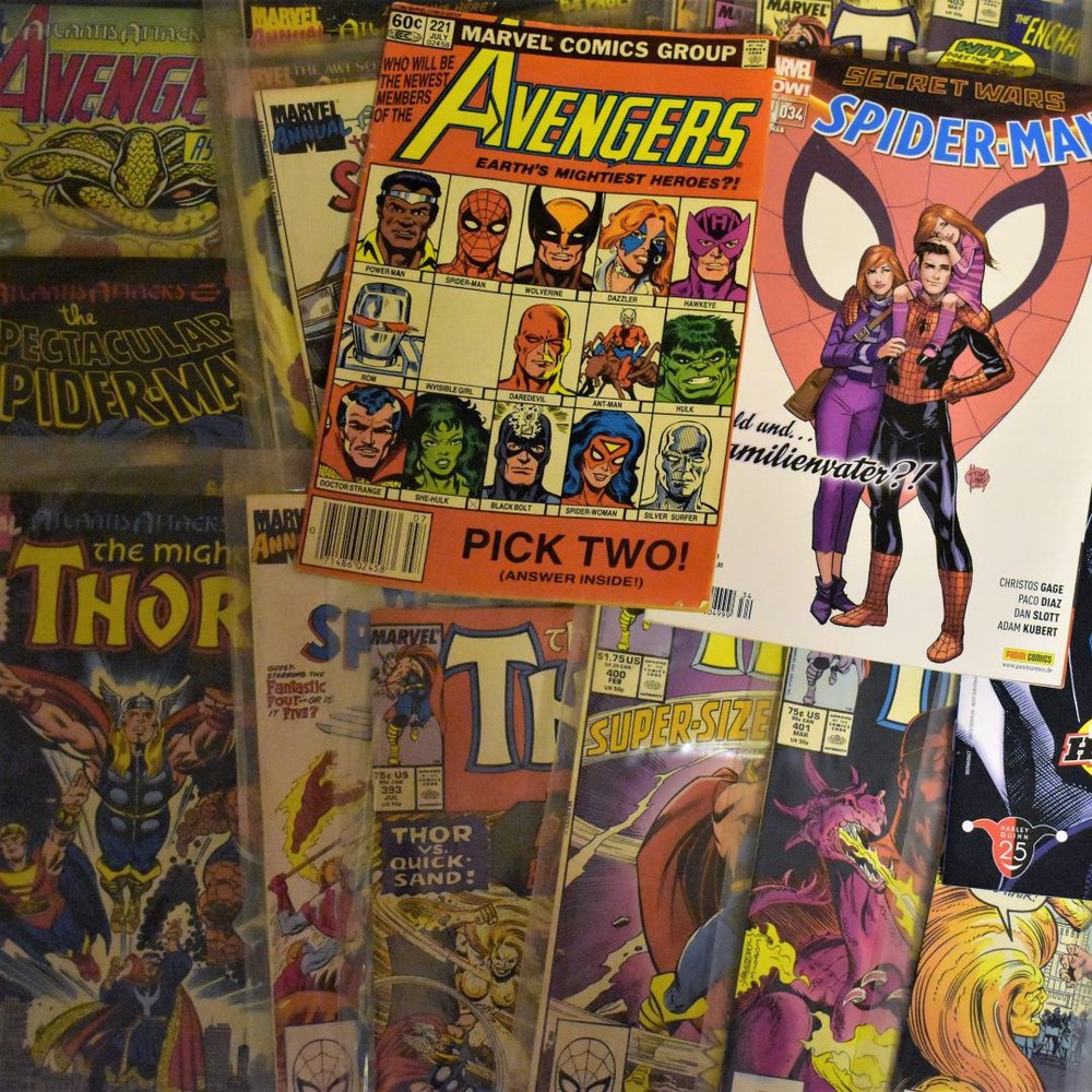Pile of superhero comics