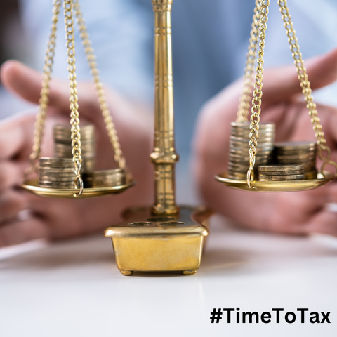 Weighing scales, with the hashtag #TimeToTax